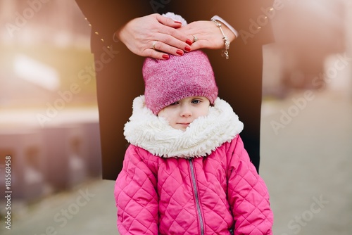 Little 2 years old child girl on winter walk