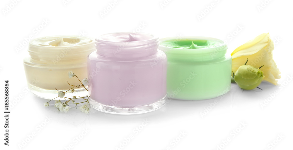 Jars with body cream on white background Jars with body cream on white background