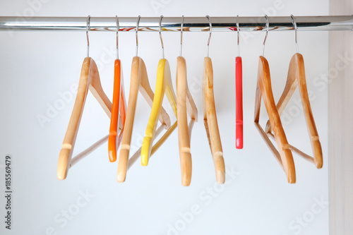 Clothes hangers in empty wardrobe