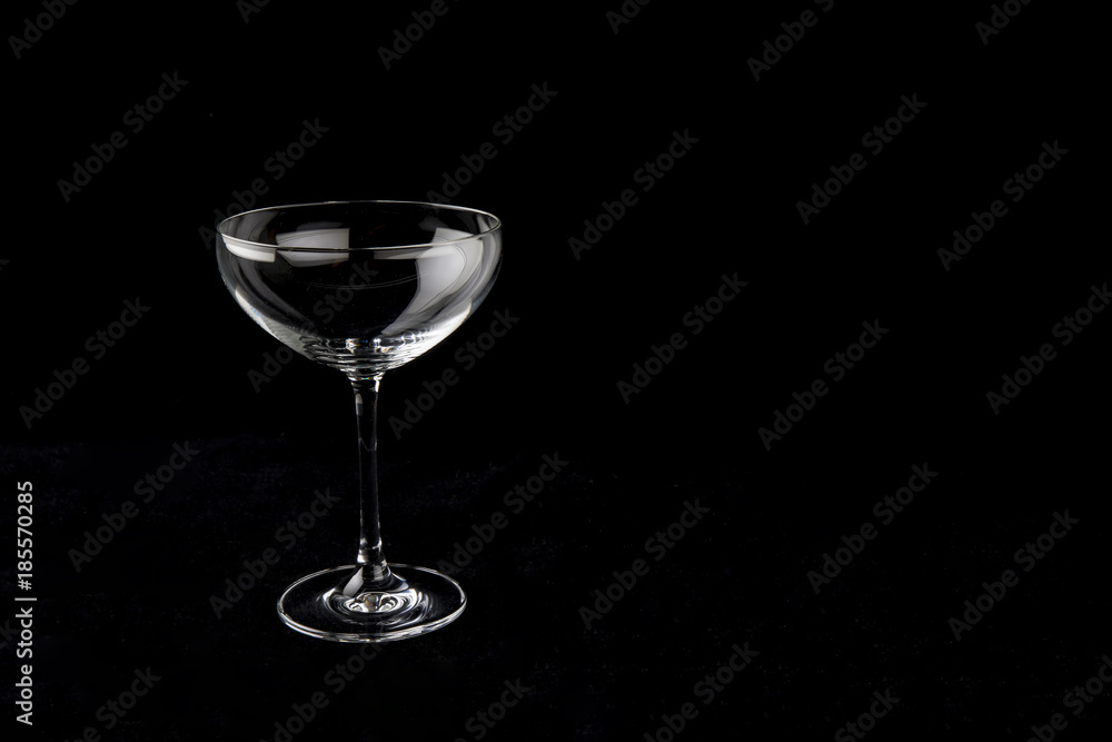 Wine glass on the black background