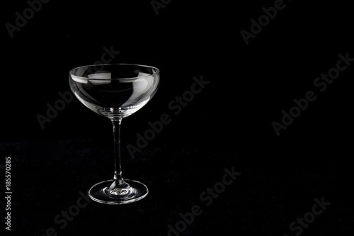 Wine glass on the black background