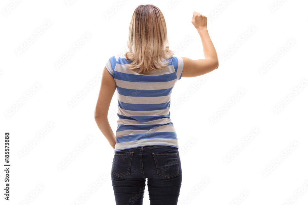 Young woman knocking on a door Young woman knocking on a door