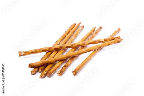 Salty cracker pretzel sticks isolated on white background