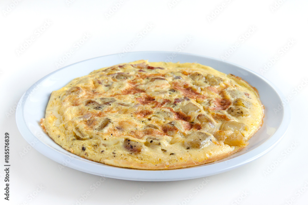 italian frittata on white background, typical dish with eggs, potatoes and bacon italian frittata on white background, typical dish with eggs, potatoes and bacon