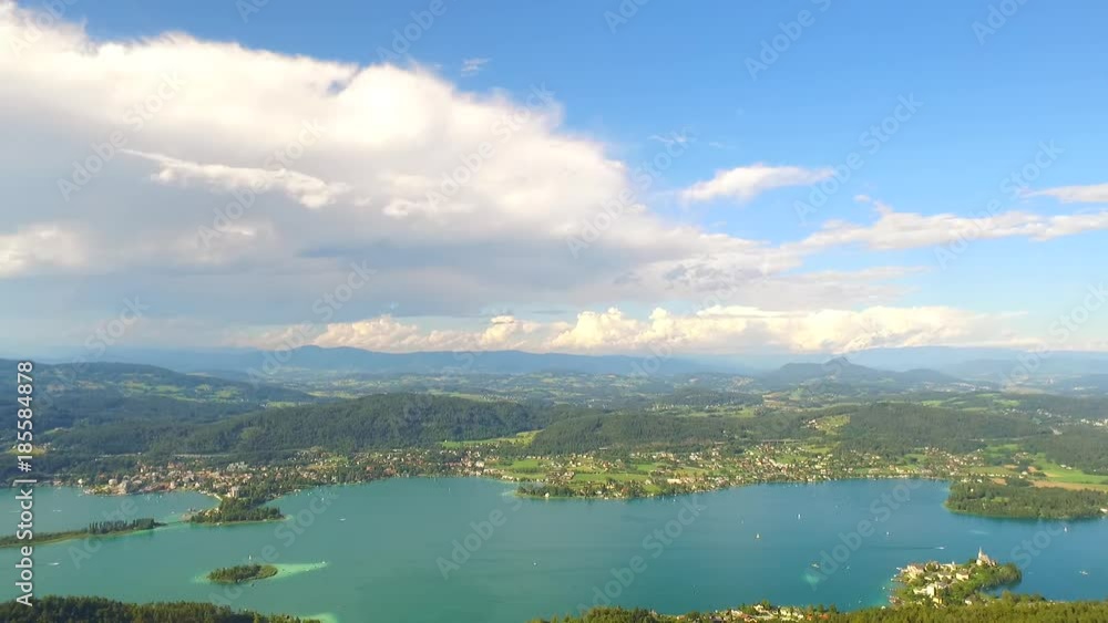 Lake WortherSee, Austria, Europe. City Klagenfurt and its surround with beautiful forests and big lake. Summer time. A view from biggest wooden tower in the world, PyramidenKogel, 300 ft high.