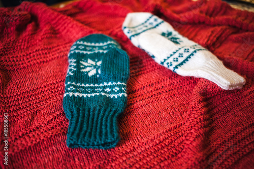 Two knitted mittens.