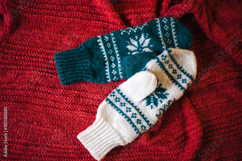 Two knitted mittens.