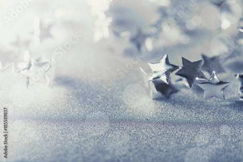 Silver Christmas composition with tiny stars sparkling