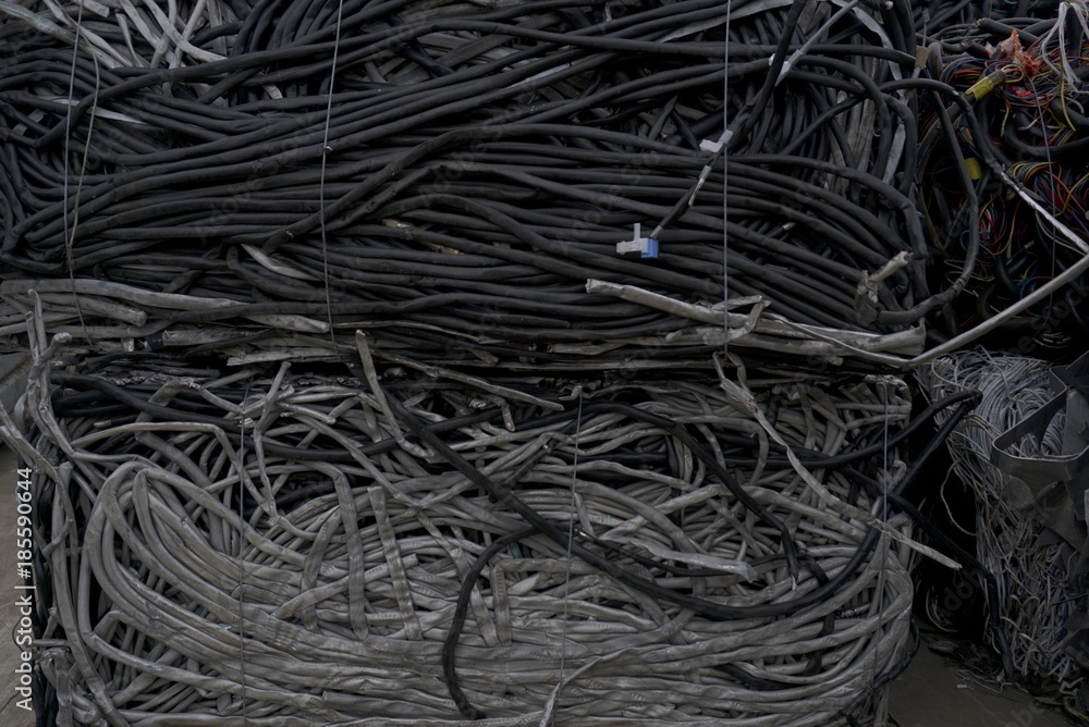 Scrapyard recycling center creates beautiful landscapes from waste metal- cars, refrigerators and cranes with claws Scrapyard recycling center creates beautiful landscapes from waste metal- cars, refrigerators and cranes with claws