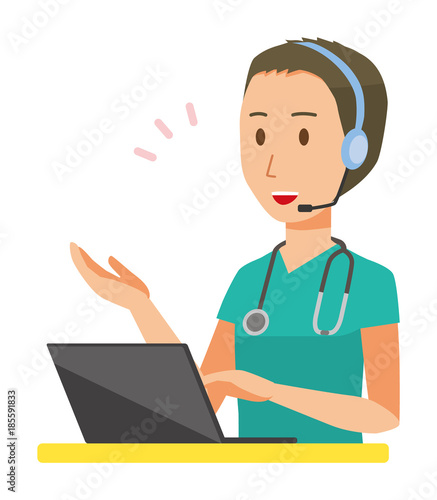 A male doctor wearing a green scrub is talking on the headset