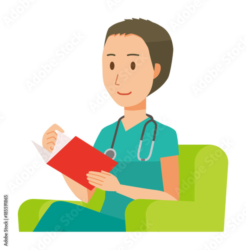 A male doctor wearing a green scrub sits on a sofa and is reading books