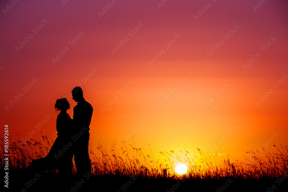 wedding couple with the sunset