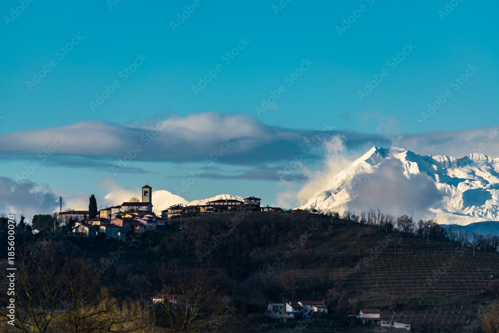 Mount Kanin over Slovenian village