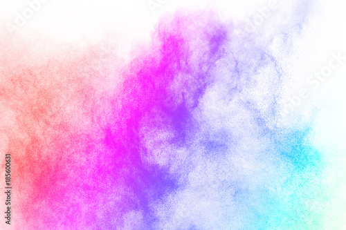 abstract multicolored powder splatted on white background,Freeze motion of color powder exploding.