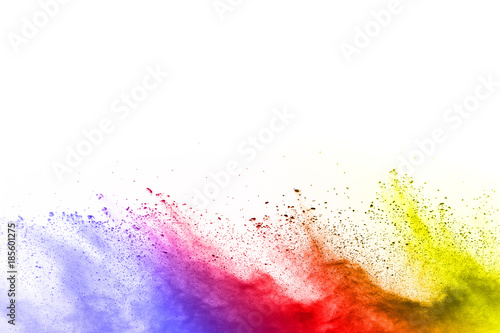 abstract multicolored powder splatted on white background Freeze motion of color powder exploding.