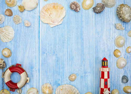 Maritime background with sea shells, lifebuoy and lighthouse