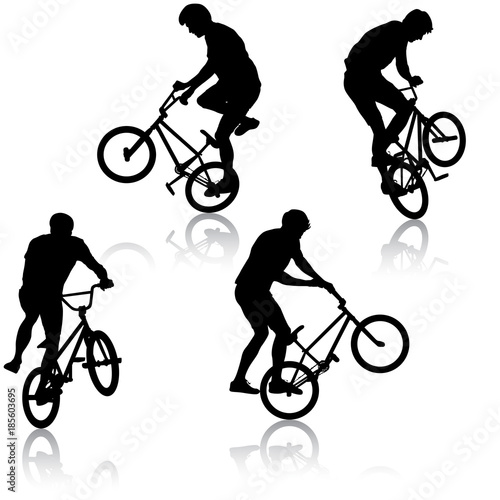 Set silhouette of a cyclist male performing acrobatic pirouettes. vector illustration
