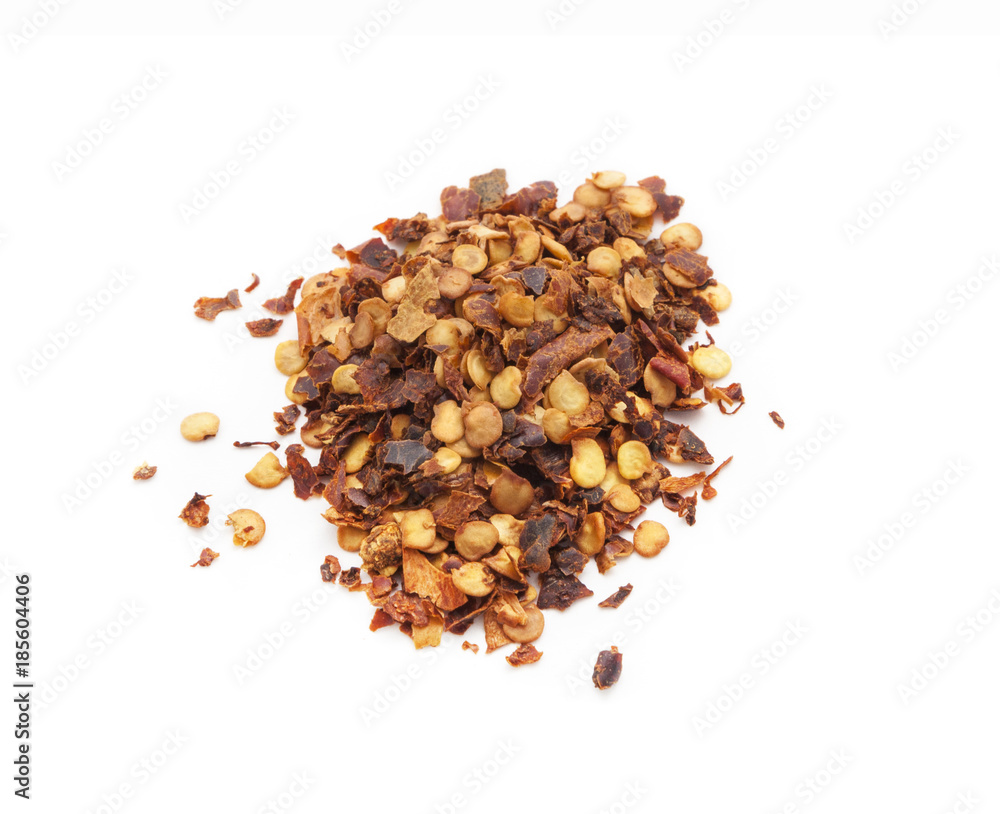 Obraz premium Red hot chili flakes, isolated on white