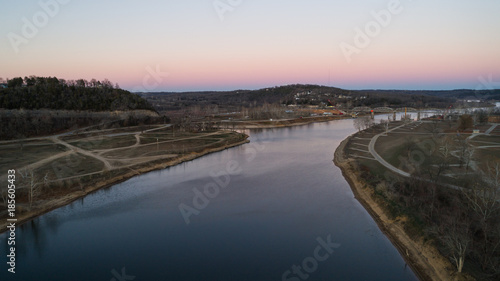 Aerial view of Bull Shoals lake and bridge being built.
