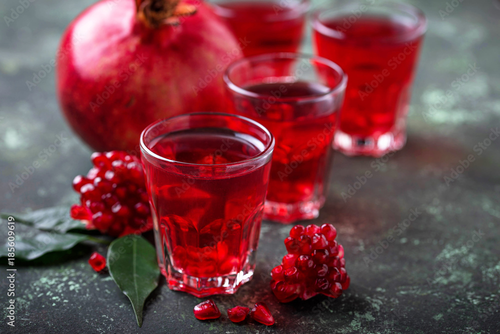 Glasses of fresh pomegranate juice. Glasses of fresh pomegranate juice.