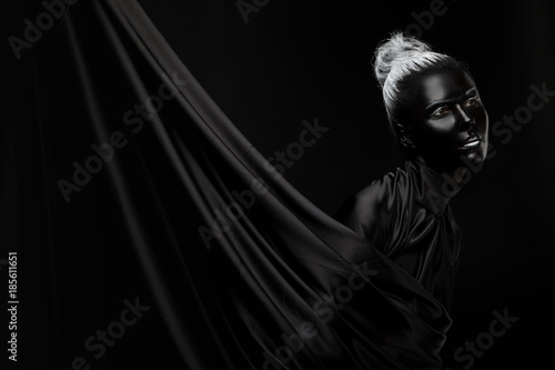Black makeup stylish make-up, portrait with with black cloth