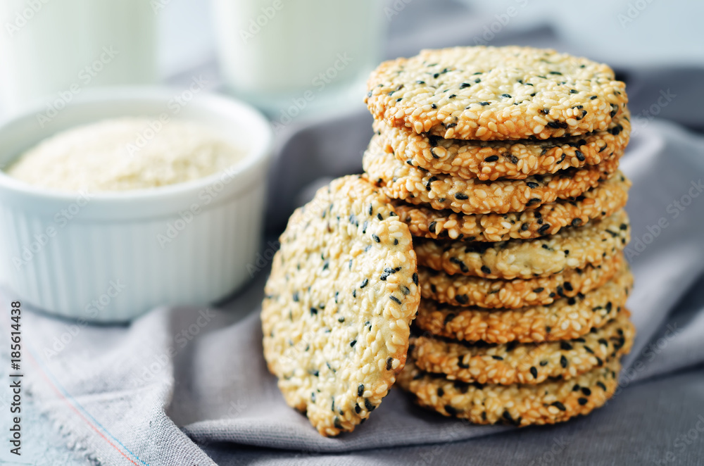 Sesame cookies with glasses of milk Sesame cookies with glasses of milk
