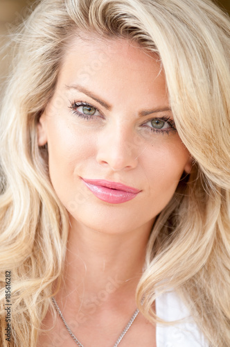 Head shot of a beautiful blond haired women.