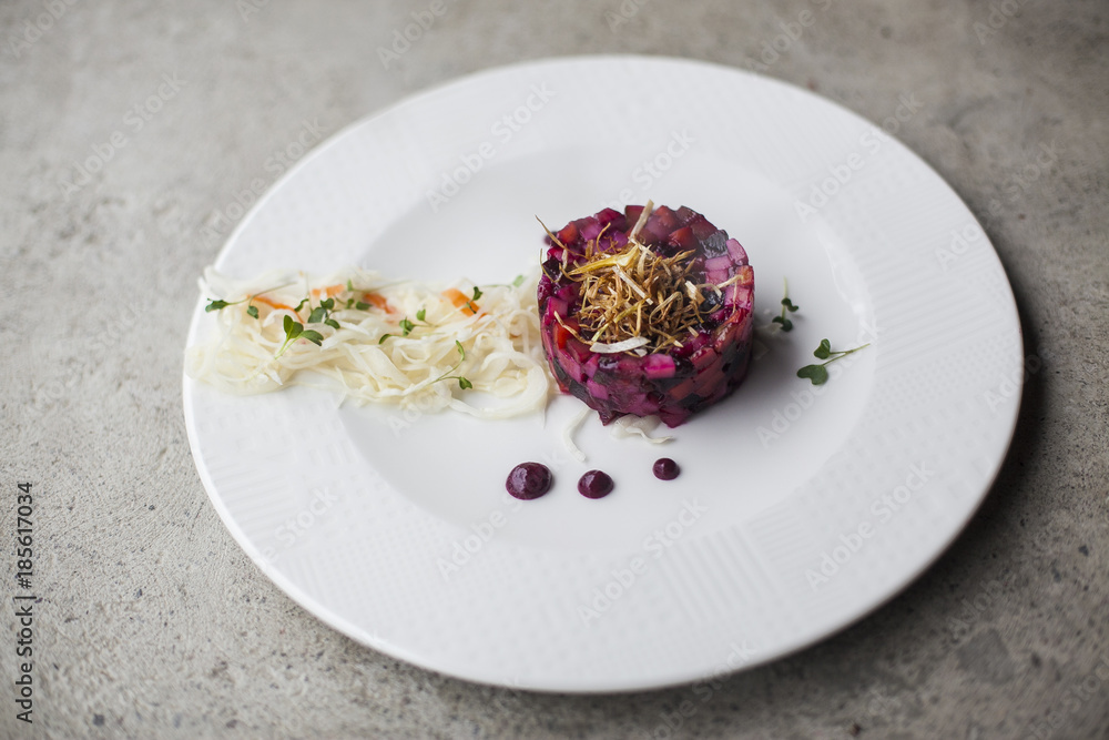 salad of vinaigrette on a white plate salad of vinaigrette on a white plate