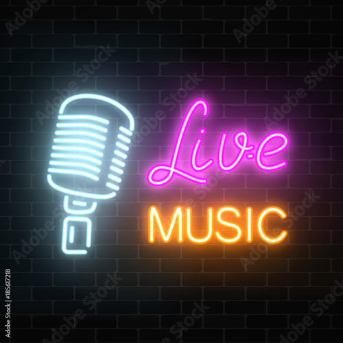 Neon signboard of nightclub with live music. Glowing street sign of bar with karaoke and live singers.