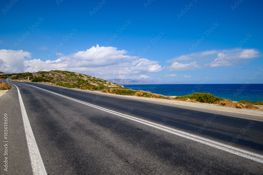 Asphalt road along the sea. Greece, Crete.