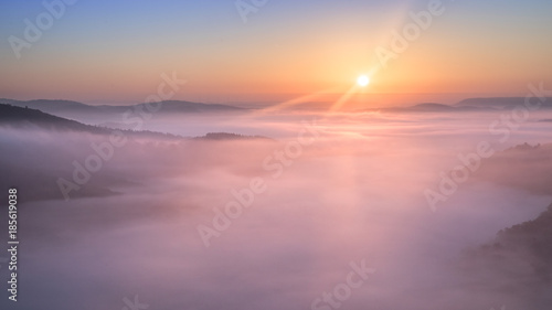 Sunrise over Mountains with Clouds © Ralph