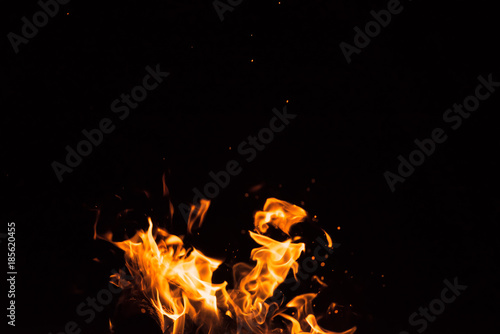fire spark fire black background © dmytro_khlystun