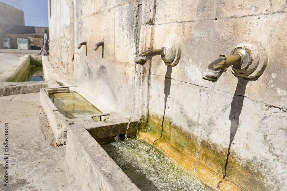ancient water fountain in Mecerreyes, province of Burgos, Spain ancient water fountain in Mecerreyes, province of Burgos, Spain