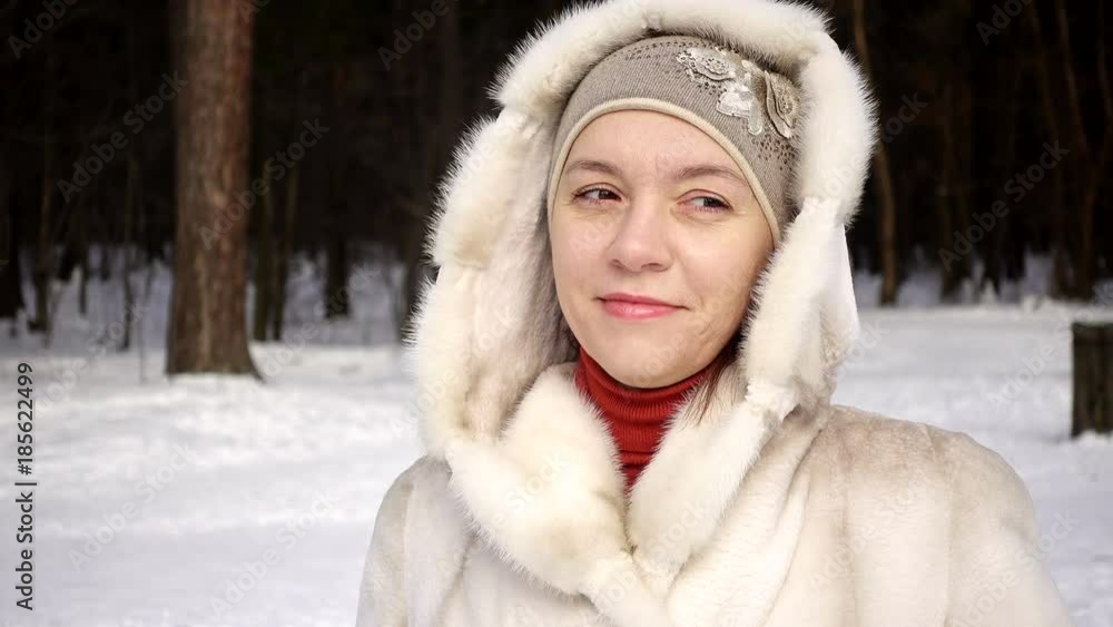 Woman in a mink coat in the forest. Woman in a mink coat in the forest.