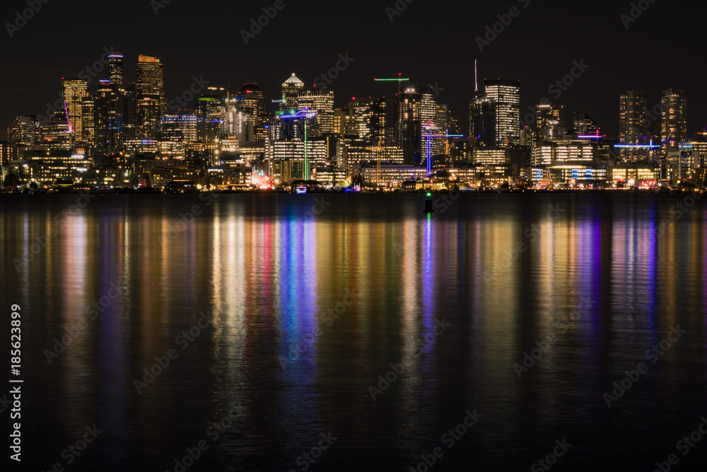 Seattle skyline at night reflecting in Lake Washington
