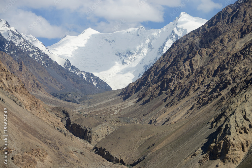 Afghan Wakhan valley as seen from the Tajik border, Pamir Mountain Range, Tajikistan Afghan Wakhan valley as seen from the Tajik border, Pamir Mountain Range, Tajikistan