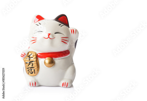 Maneki Neko ceramic japanese lucky cat isolated on white background