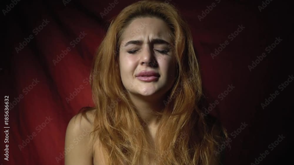Beautiful red-haired woman shows how frustrated she is and disappointed Beautiful red-haired woman shows how frustrated she is and disappointed