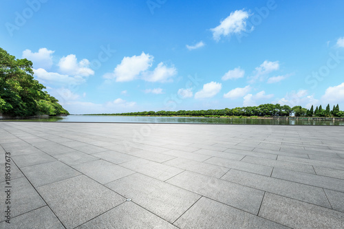 empty square floor and nature landscape under the blue sky