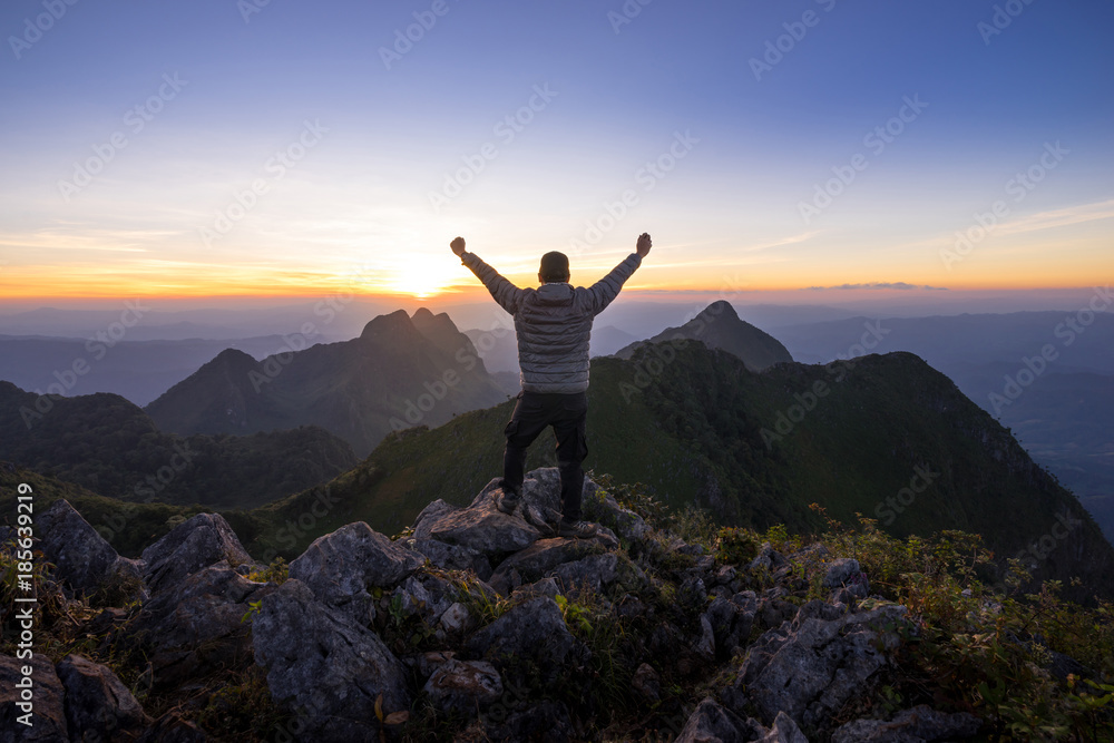 Man reaches the peak of Doi Luang Chiang Dao Man reaches the peak of Doi Luang Chiang Dao