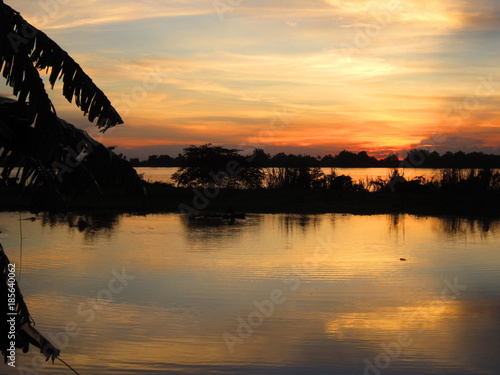 The Mekong in flood at sunset photo