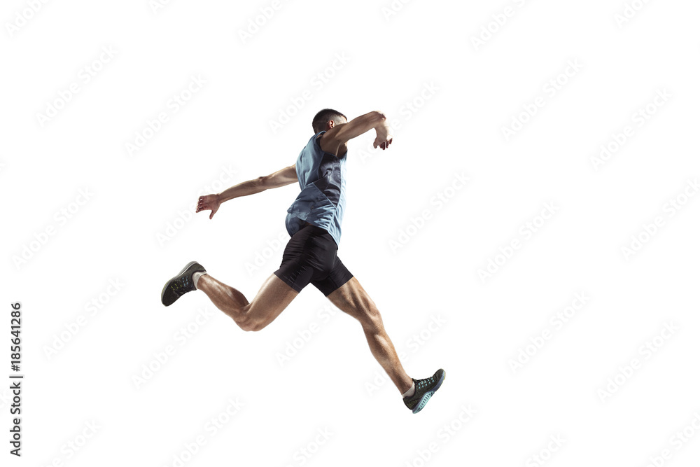 The studio shot of high jump athlete is in action