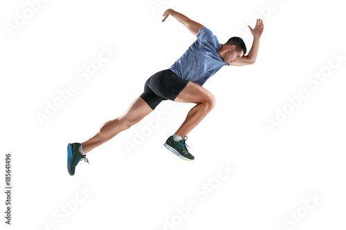 The studio shot of high jump athlete is in action