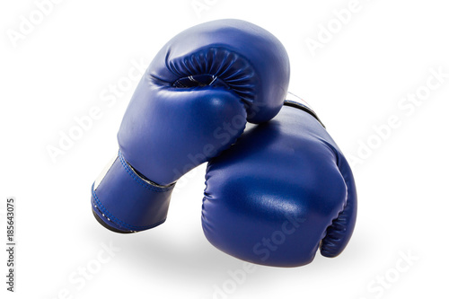 Blue mitt or boxing glove isolated on white background with clipping path. Boxing glove usually used in training boxers and other combat. © indysystem