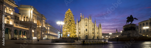 Milan, Italy: Panoramic view of the Duomo square with the illuminated Christmas tree, the Milan cathedral and the Vittorio Emanuele II Gallery.