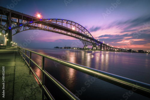 Blue Water Bridge Cityscape Panorama. The waterfront district of Port Huron, Michigan with the Blue Water Bridge. The Bridge connects the USA and Canada. photo