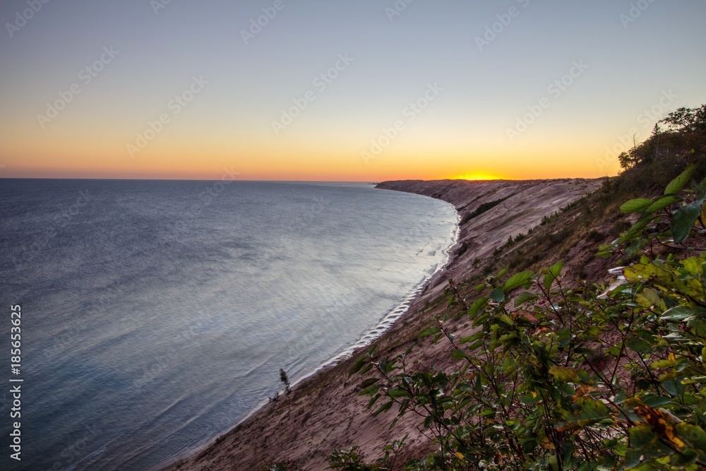 Pictured Rocks National Lakeshore. Sunrise along massive sand dune peninsula at the Pictured Rocks National Lakeshore in Grand Marais, Michigan, USA.