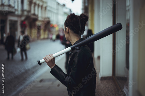 Beautiful blonde with a baseball bat
