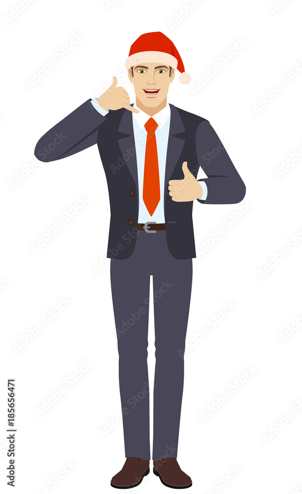 Businessman in Santa showing a call me sign and showing thumb up Businessman in Santa showing a call me sign and showing thumb up