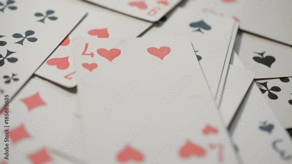 Dealing pack of playing cards showing slow motion Dealing pack of playing cards showing slow motion